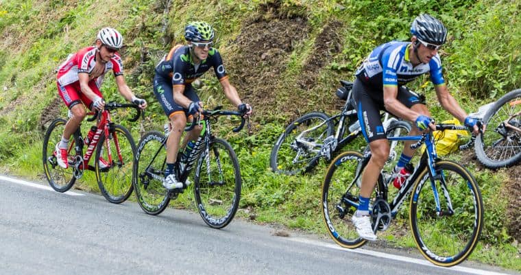 Professional cyclists climbing in a mountain stage