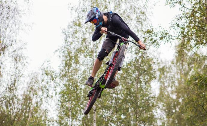 cyclist on a downhill mountain bike suspended midair