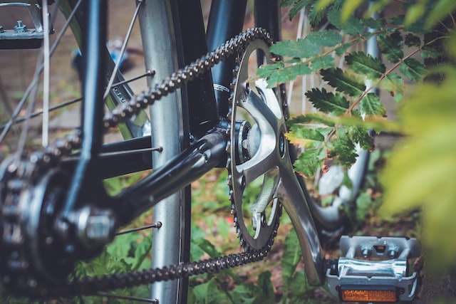 a close up of a bicycle with a chain on it